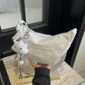 喜挖2店 2026新款學生休閒唯美個性包包女洋氣潮韓版餃子包大容量斜後背包
