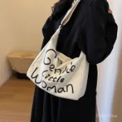 韓版潮流⭐帆布包休閒斜挎帆布包女2024新款小衆字母包百搭單肩餃子包