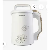 九陽全自動豆漿機（型號如 DJ13M-D08D 或類似系列），外觀為白色機身並帶有金色花卉圖案與手把