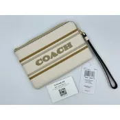 貓咪購購🌸買1送1個購物袋｜美國正品｜免運+原包裝COACH 小手拿包｜奶白線條 ｜小手拿 Logo文字款