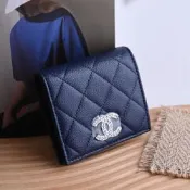 CHANEL 限定款鏤空雙C菱格車線小牛皮對開扣式零錢短夾(深藍)