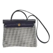 【Hermes 愛馬仕】HERBAG ZIP金色穿釦鎖頭造型帆布手提/肩背包(黑/米白色H082926-BLK-WHI)