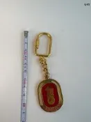 新加坡魚尾獅金屬鑰匙扣，金屬材質，正靣魚尾獅圖案，背靣SINGAPORE字樣，尺寸約7cm，重28g，保存很新，幾乎沒用