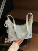 喜挖2店 牛仔布包女夏天2025新款潮時尚小眾設計單肩腋下包質感洋氣餃子包