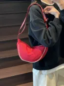 喜挖2店 高級質感帆布包包女2026新款小眾設計斜背布袋休閒秋冬通勤餃子包