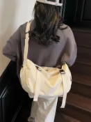 喜挖2店 日系斜後背包女機能騎行包潮牌休閒瑜伽包男大容量旅行單肩包餃子包