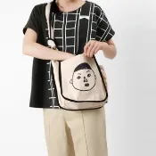 大頭男同學綁帶帆布側背包