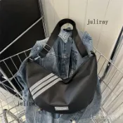 新品熱銷 免運🎀大容量餃子包包女新款2023時尚佈包單肩包休閒百搭短途旅行斜挎包