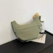 喜挖2店 新款純色時尚大容量通勤餃子包女拉鏈個性休閒潮流高級斜後背包