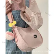 ✨可開發票#斜挎包大學生上課書包日係尼龍佈餃子包百搭寬帶單肩手提帆佈書袋#免運費