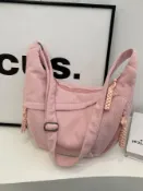 喜挖2店 日系簡約大容量斜後背包女2024新款學生小挎包運動百搭揹包餃子包女