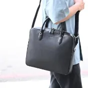 【BALLY】簡約經典LOGO烙印小牛皮手提兩用包商務包公事包(黑)