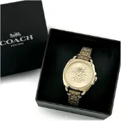 COACH 蔻馳 Boyfriend 經典LOGO緹花織布晶鑽腕錶34mm(金/桃心木咖色)