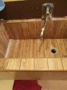 ＊長安建材行＊ 泰國某民宿的拖把槽 ，用長條型木紋磚，連修邊條也是少見的咖啡色，一體的設計