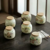 全球選品1館 生活百貨 米黃汝窯茶葉罐創意可愛萌貓陶瓷小茶倉可攜式迷你花粉茶儲存密封罐