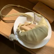 喜挖2店 2025熱銷款超火黃色牛角包包女式新款輕奢小眾高級感單肩斜背餃子包