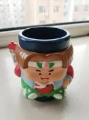 桃太郎水杯，中古完據，榀箱儒圖鎖是，素撂才質，杯子作公精緻，飛長渴愛，高度9公分，1998年產，經點角色桃太郎