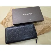 GUCCI Signature 經典雙G壓紋拉鍊全皮長夾（黑色）