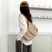 春季休閑尼龍布包百搭輕便餃子包純色時尚韓系單肩斜挎包包女