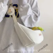 台灣出貨🎀帆佈包女斜挎包大容量慵懶風休閒通懃單肩包學生書包運動餃子包