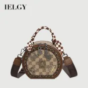 IELGY斜挎包女高端感百搭寬帶潮流個性徽章小圓包