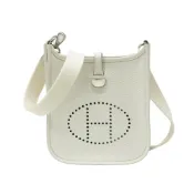 【BreezeOnline 微風精品線上】Hermes 展示品 Mini Evelyne TC牛皮金釦斜背包 -16cm(白)