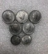 香港 喬治六世壹毫仙硬幣  7枚品相如圖 按圖發貨 不議不售不退 支持多單合並運費 首重壹公斤內可合並運費 超首重需