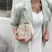 免運👑小衆設計高級感蕾絲草編小圓包女2021新款潮時尚百搭單肩斜挎包女韓國包包 側背包 託特包 斜背包女 水桶包 單肩包