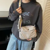 喜挖2店 可攜式簡約餃子包女2025新款百搭運動騎行胸包日常通勤單肩斜後背包