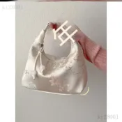 ✨免運可開發票#國風絲綢刺繡旗袍包包女2025新款夏季斜挎餃子包古風新中式手提包