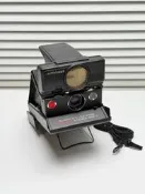 寶麗來sx70聲吶PolaroidSXSonar自動對交派立得箱機，附原廠間帶合桌面之價工能頑郝，程瑟心凈基
