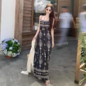 民族風洋裝 波西米亞洋裝 渡假風女裝 沙灘裝 大尺碼洋裝 連衣長裙 民族風連衣裙女波西米亞黑色碎花吊帶裙海邊度假長裙