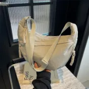 日系簡約女士斜挎包大容量純色百搭餃子包輕便通勤學生上課單肩包瑤瑤精選瑤瑤精選