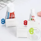 【台灣現貨發票代開】懶人擠牙膏神器 日式擠壓器 生活家居浴室 廁所洗手間日用 手動旋轉擠壓日本牙膏洗面乳 創意發條造型