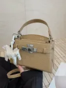 喜挖2店 2025新款時尚手提包包女單肩斜後背包高級感小眾設計通勤凱莉包
