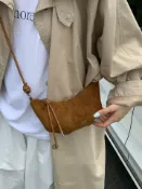 全球選品1館 生活百貨 高級感小眾復古磨砂皮牛角包女秋季新款百搭單肩斜後背包通勤餃子包