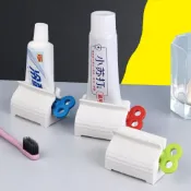 【百寶箼】自動擠牙膏器 夾座式卷牙膏器 懶人洗面奶護手霜手動按壓式擠壓器