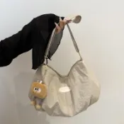 新款大容量帆布包包女夏季高級感百搭斜挎包時尚文藝餃子包雲朵包