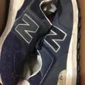 Invincible x New Balance ML574