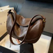喜挖2店 小眾設計包包女2025新款美拉德復古簡約單肩腋下包百搭斜背餃子包