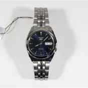 SEIKO WATCH 精工盾牌五號銀刻劃寶藍5號圖騰紋面星期.日期鋼帶機械腕錶 型號：SNK357K1【神梭鐘錶】