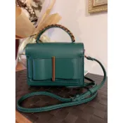 新加坡🇸🇬平價時尚精品CHARLES&KEITH品牌寶石綠 金扣蝴蝶禮結造型小提包