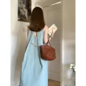 新品直髮2023新款露背吊帶無袖背心洋裝女夏設計感小眾寬鬆顯白沙灘長裙